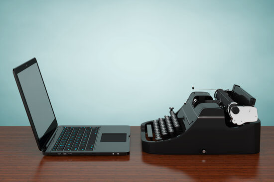 laptop and typewriter